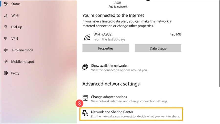 Chọn Status > Network and Sharing Center