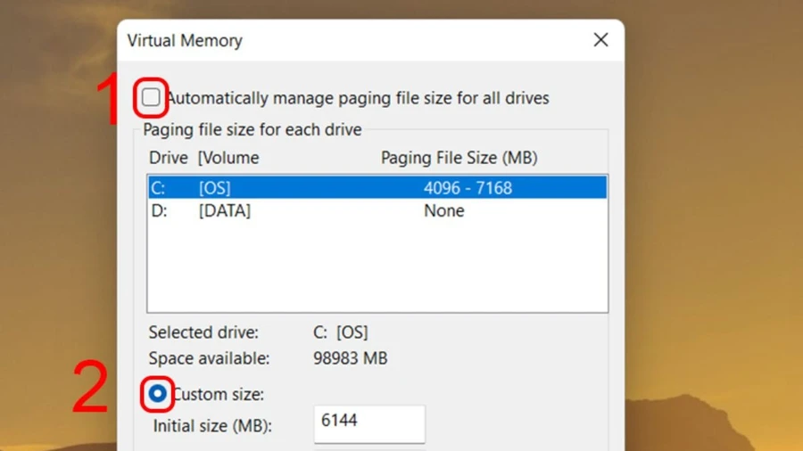 Bỏ chọn Automatically manage paging file size for all drives