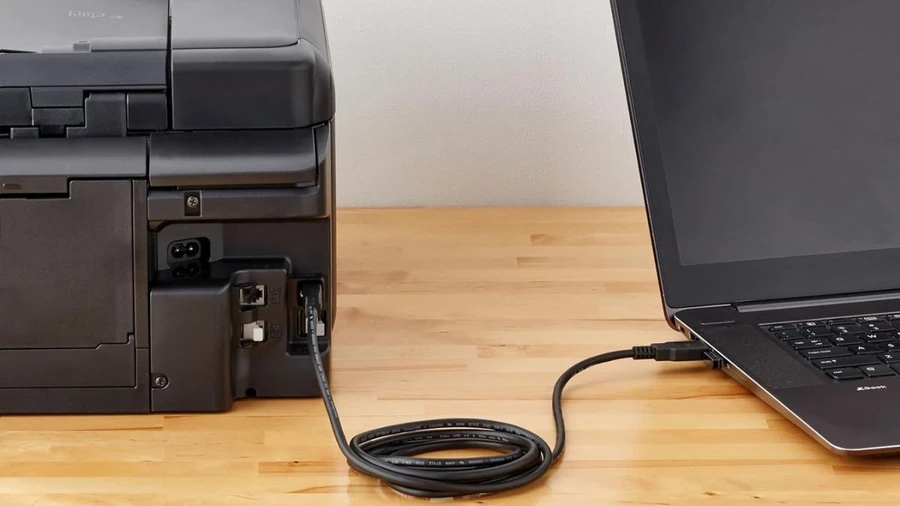Kết nối máy in với laptop bằng USB.