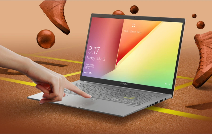 ASUS VivoBook 15 M513 với màn hình 15.6-inch, viền mỏng, bàn phím full-size và phím Enter màu Xanh Neon.