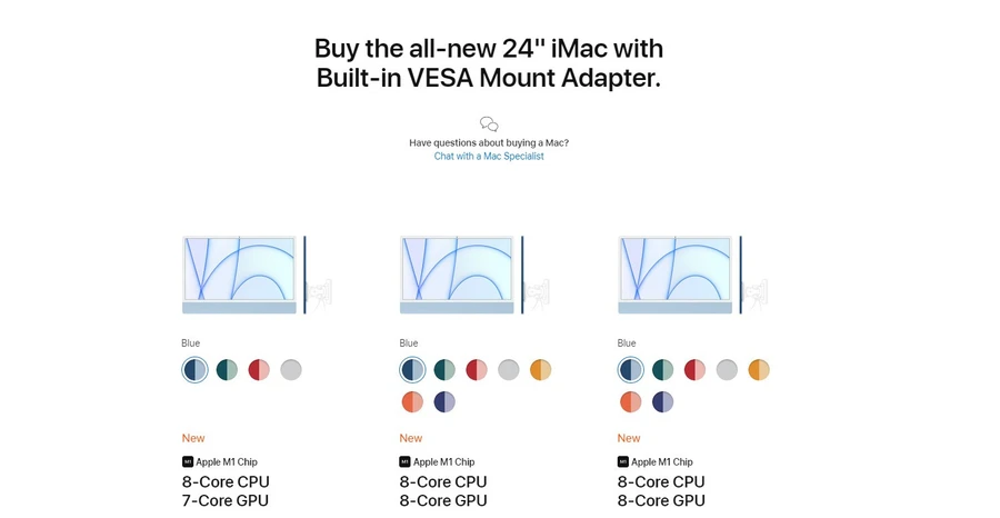 iMac M1 24-inch màu xanh lá cây với chân đế, đặt trên bàn làm việc.