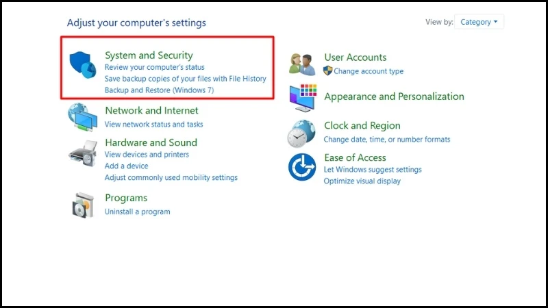 Tiếp theo chọn System and Security