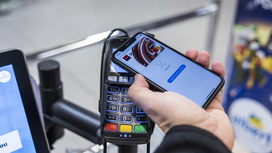Thực hiện giao dich bằng Apple Pay ở máy POS